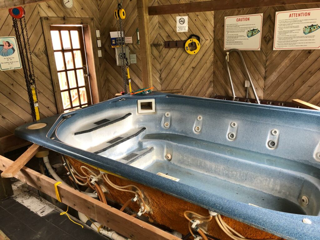 Hot Tub pulled out of the ground in a frame